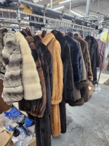 fur coats being cleaned at dry cleaner