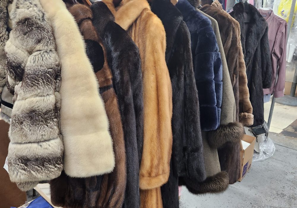 fur coats being cleaned at dry cleaner