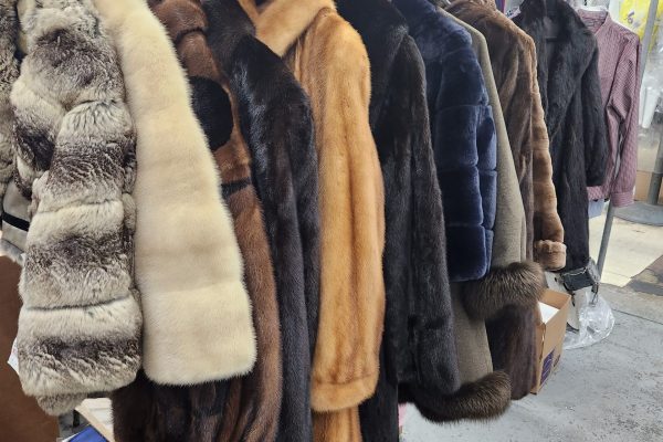 fur coats being cleaned at dry cleaner