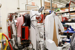 Men's shirt on pressing machine at dry cleaner's