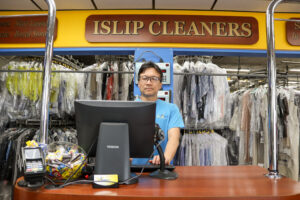 store owner working at computer