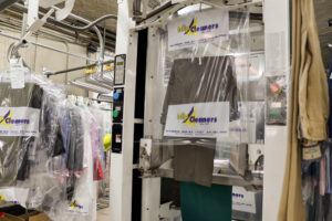 clothing being packaged on machine