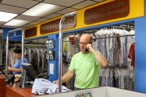 man on phone with customer